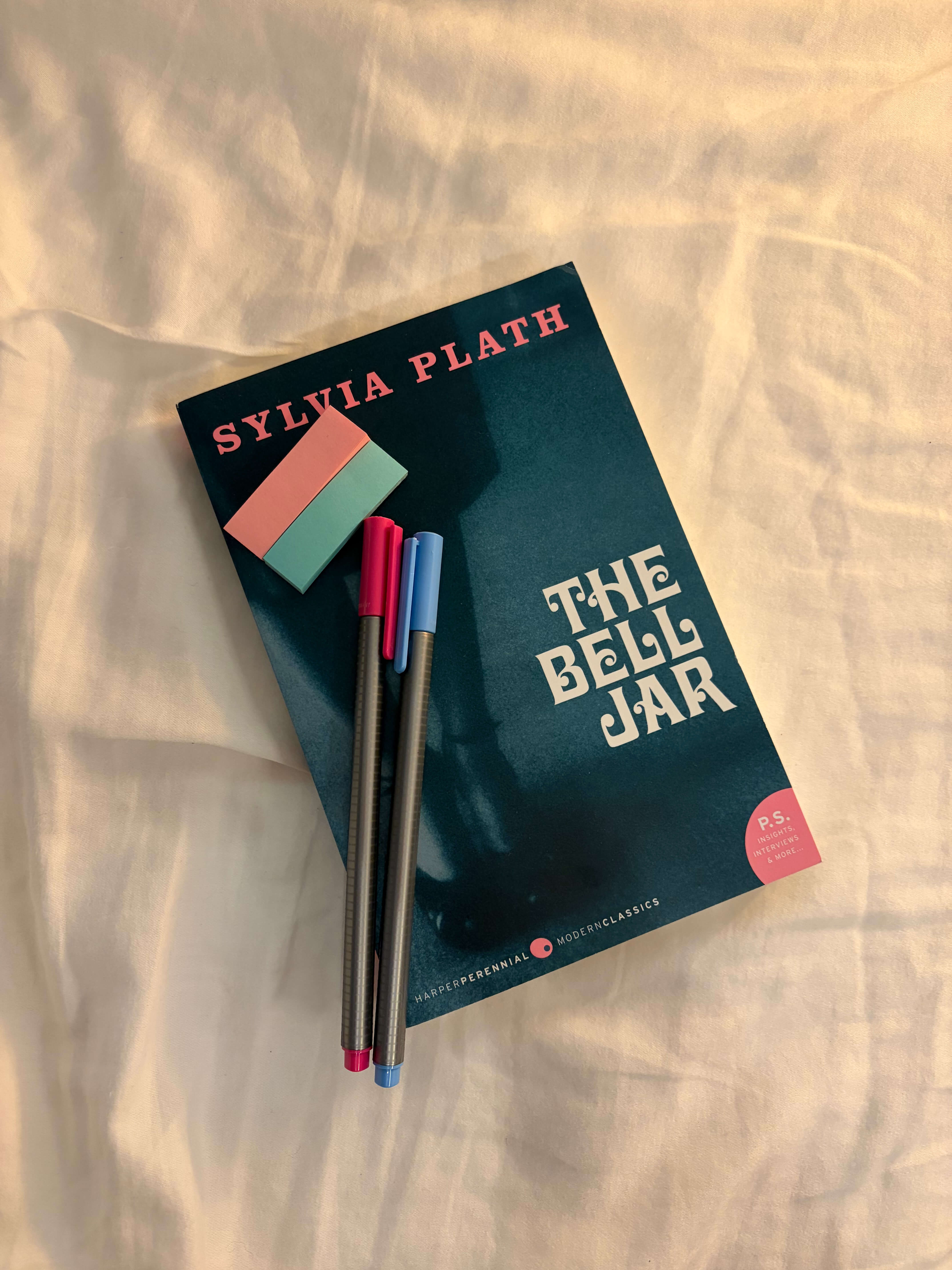 The Bell Jar with pens and sticky notes